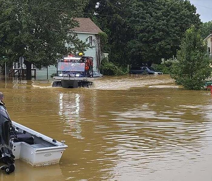 Houses and streets are flooded after a major storm.